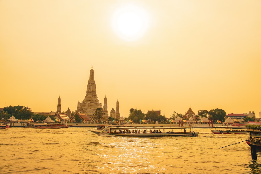 Bangkok city skyline with temple at sunset