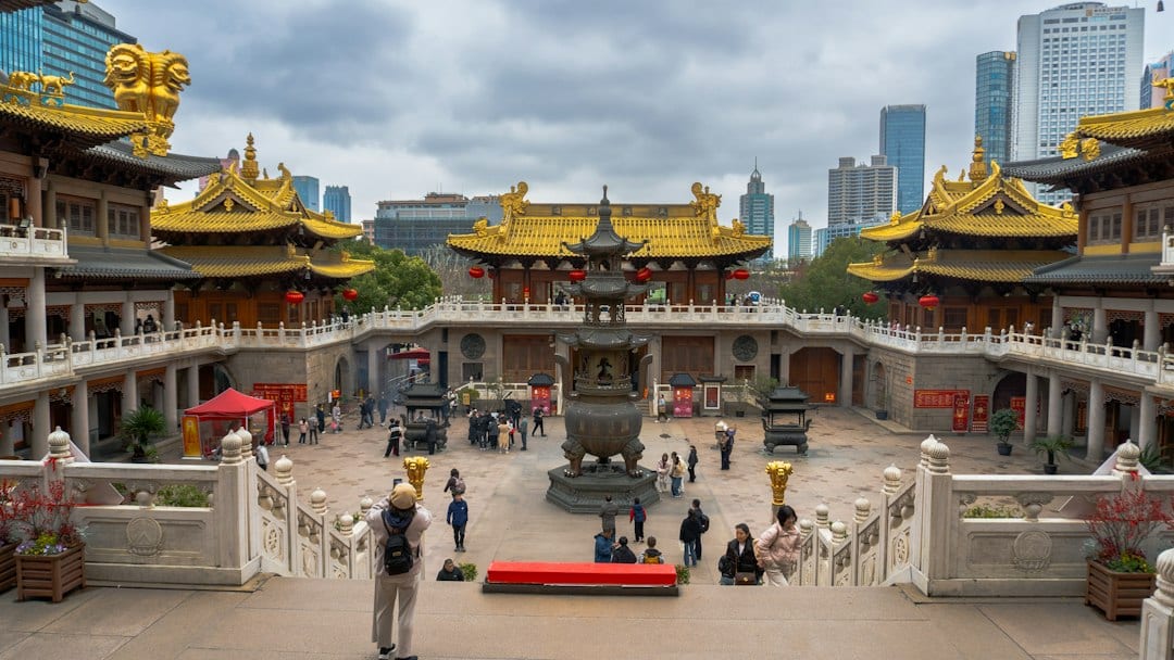 Traditional Chinese temple courtyard with red lanterns