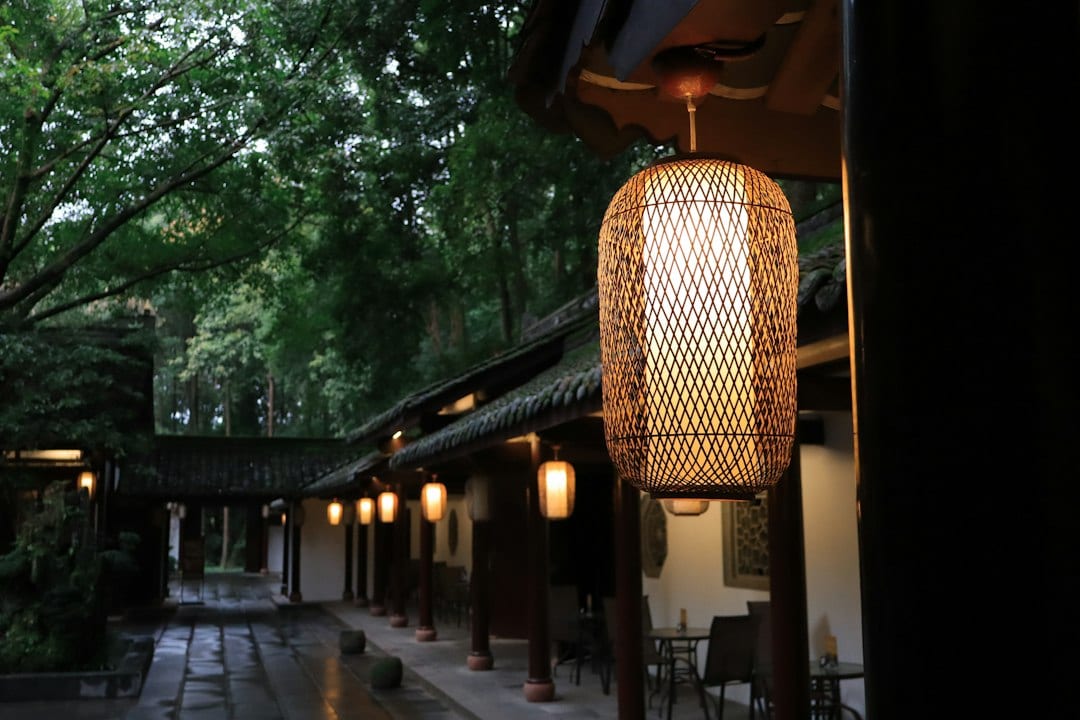 Traditional Chinese teahouse in Chengdu with bamboo chairs and tea sets