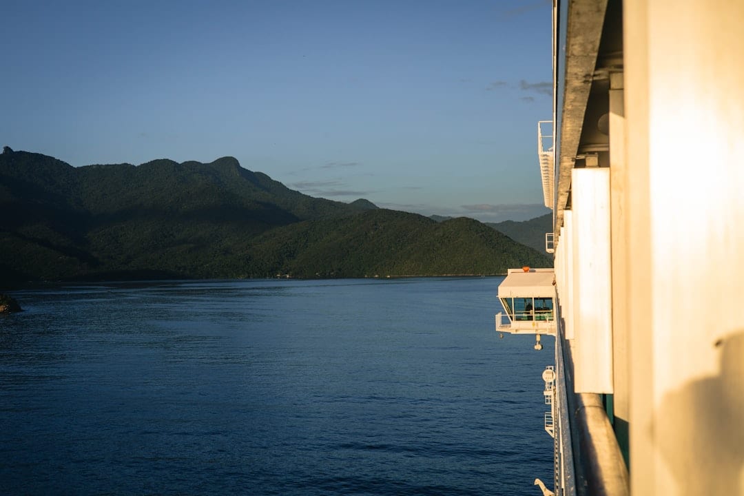 Ocean view from cruise ship with distant mountains