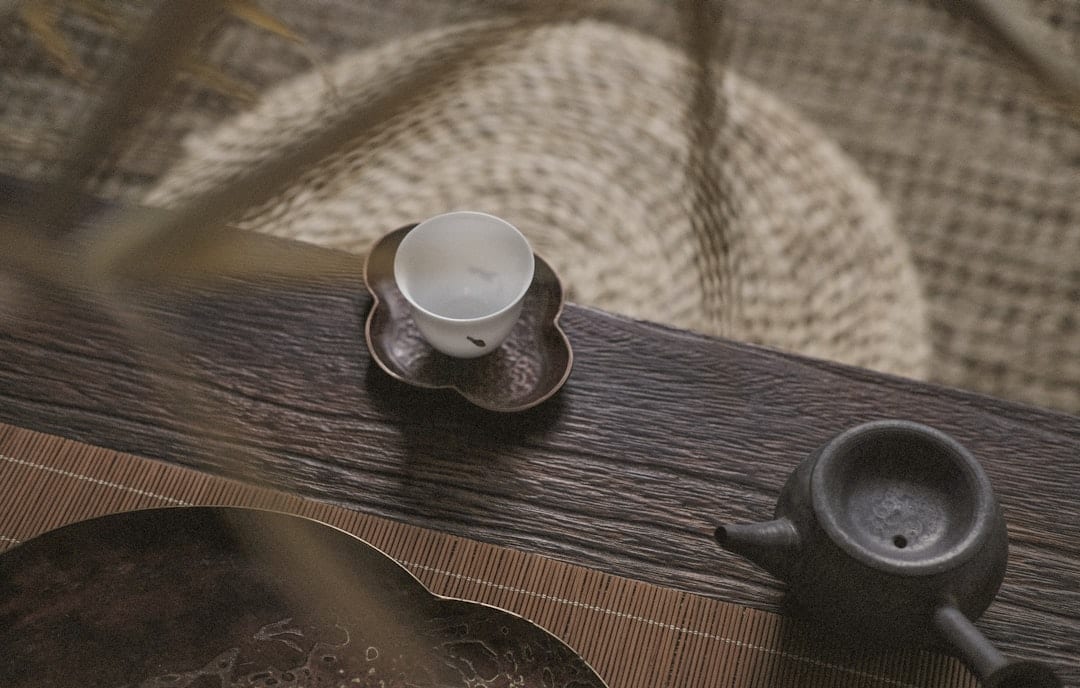 Traditional Cantonese dim sum spread with bamboo steamers in a Guangzhou teahouse