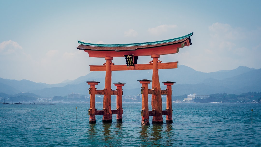 Hiroshima Miyajima floating torii gate at sunset