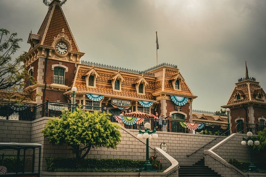 Hong Kong Disneyland castle with families on a sunny day