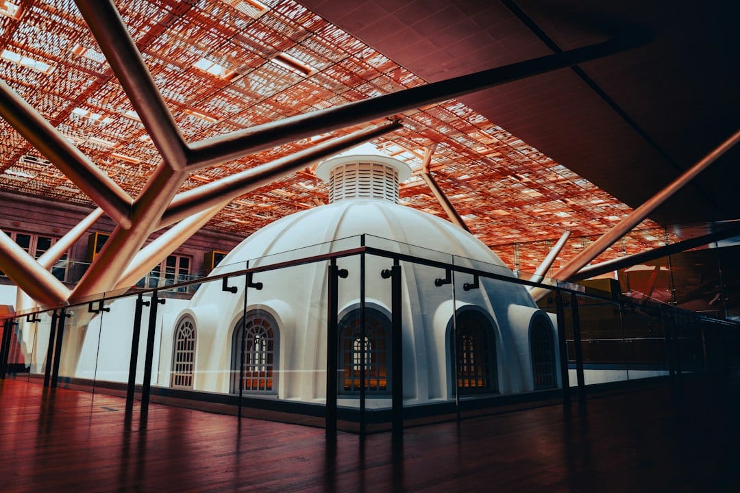 Inside a Shanghai-area indoor ski dome with artificial snow and a gentle beginner slope