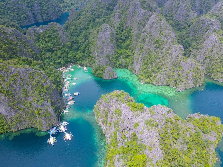 Kayangan Lake in Coron with crystal-clear water and towering limestone walls