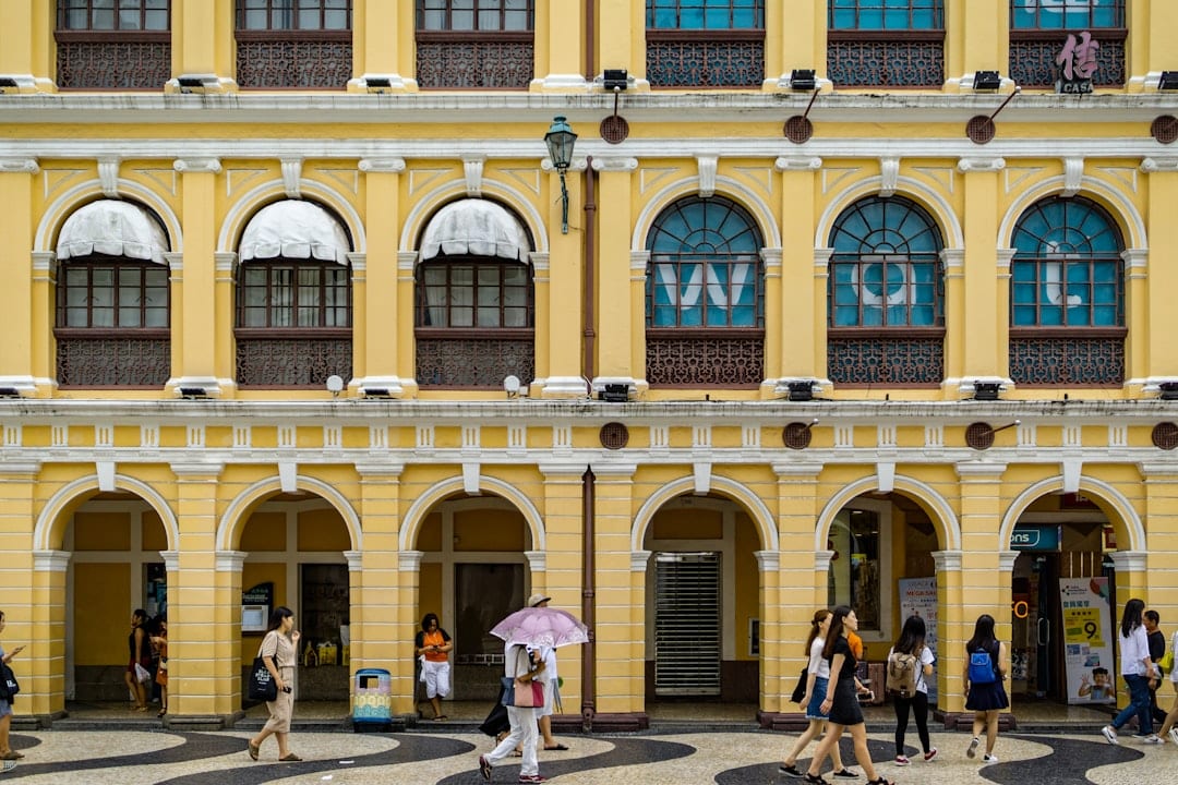 Senado Square in Macau with iconic Portuguese colonial buildings and wave-patterned cobblestones