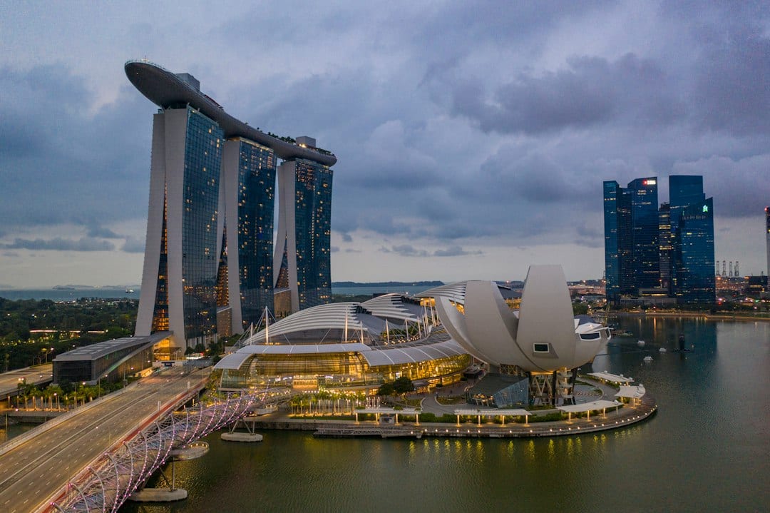 Marina Bay Cruise Centre terminal exterior with cruise ship docked