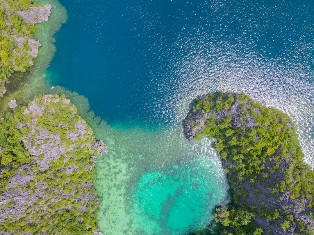 Tropical Philippine island beach with turquoise water