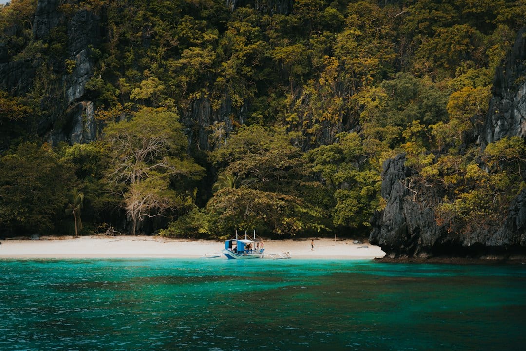 Turquoise water and limestone cliffs near Puerto Princesa, Palawan on the MSC October 2026 fly and cruise itinerary through the Philippines