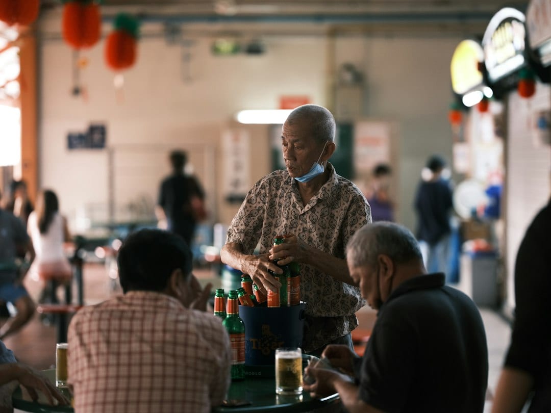 Bustling Singapore hawker center food stalls