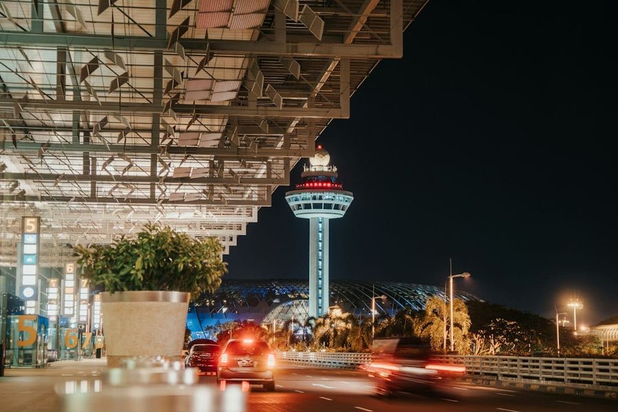 Taxi queue at Singapore Changi Airport terminal at night