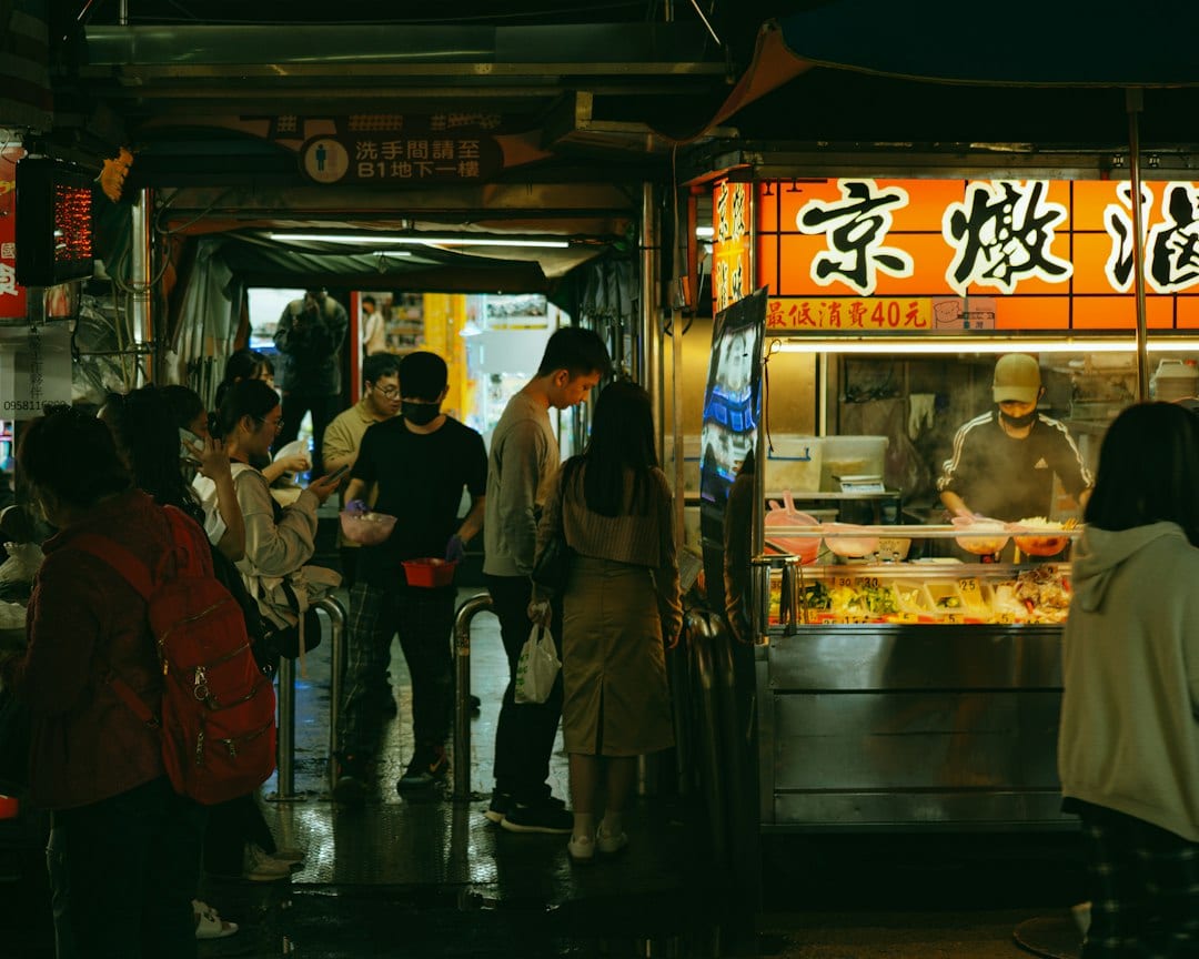 Tainan night market with local street food stalls and glowing lanterns