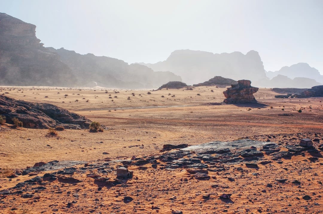 Wadi Rum desert in Jordan with dramatic red sand dunes and rock formations