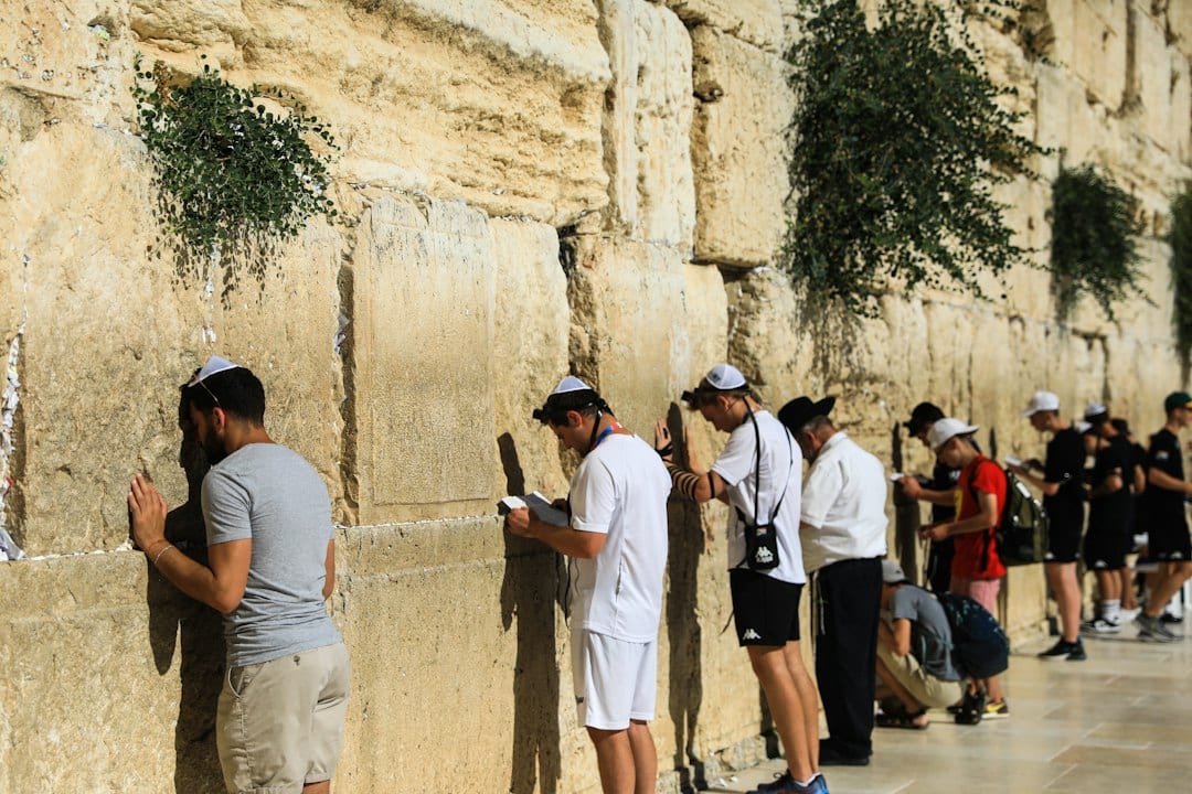 Pilgrims praying at the Western Wall in Jerusalem